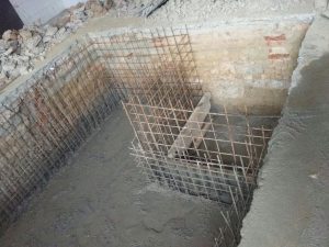 adding concrete to the foundation